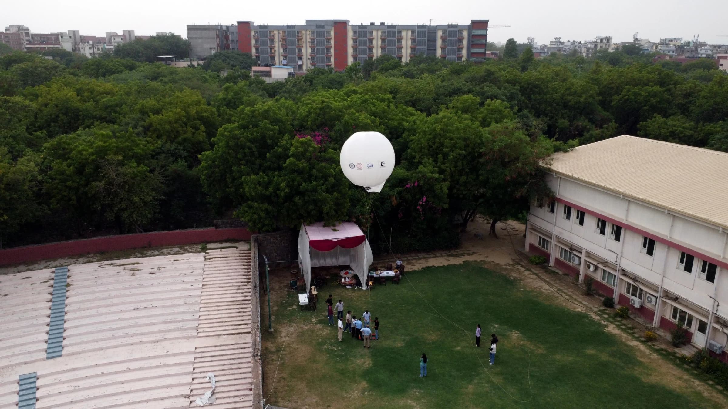 Aerial view of the aerostat launch site and ground team
