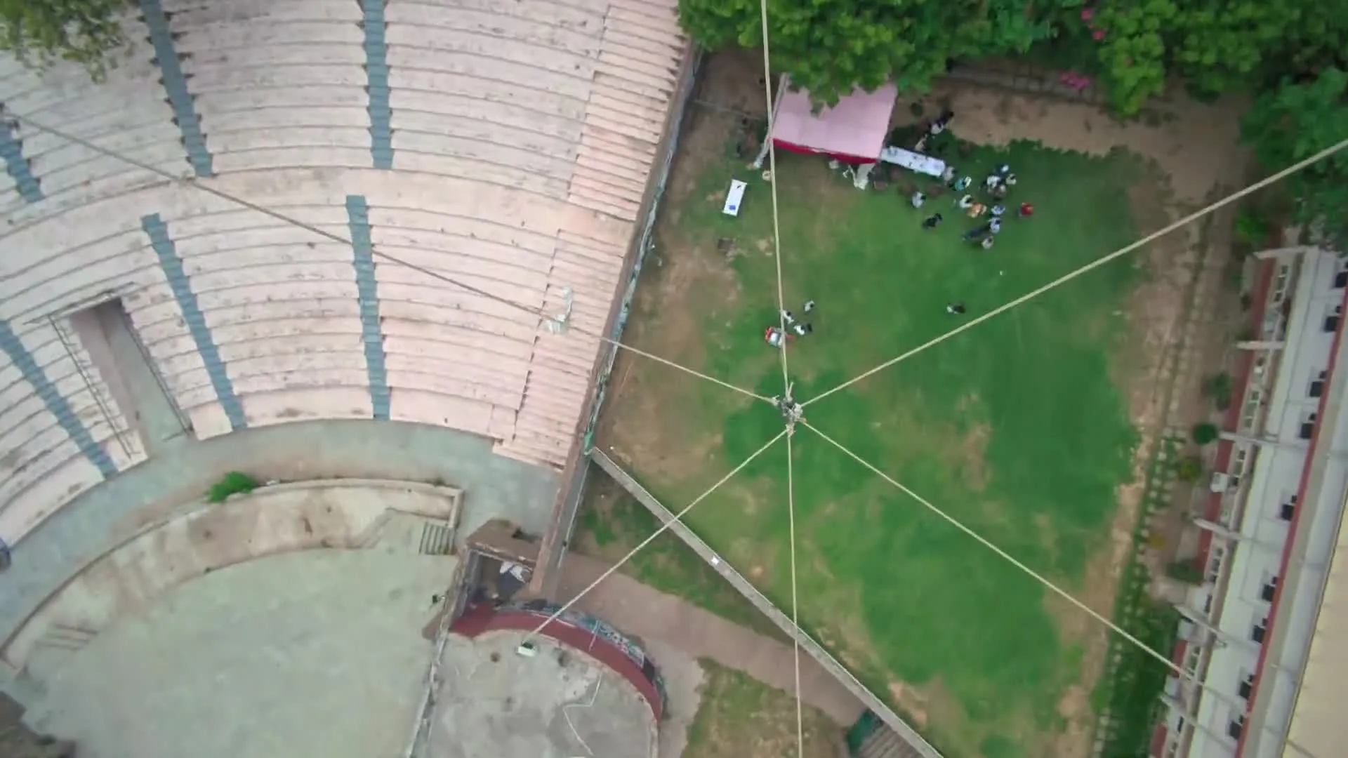 Aerial view looking straight down from a tethered GB Texcoat aerostat during a field deployment